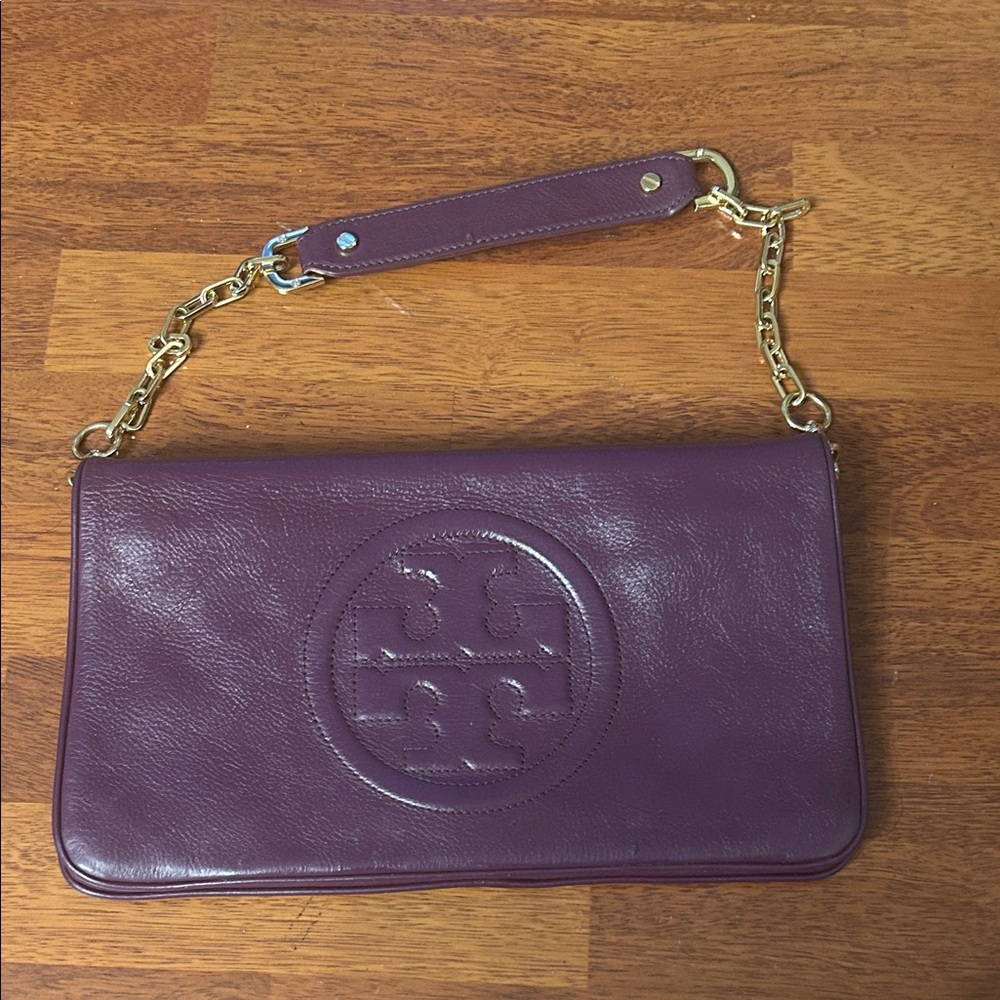 Tory Burch Plum/egg plant Leather Clutch with Gold Accents. - Picture 2 of 16